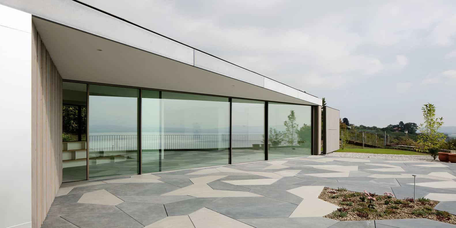 House in Hauterive, Switzerland by Bauzeit Architekten House in Hauterive, Switzerland by Bauzeit Architekten