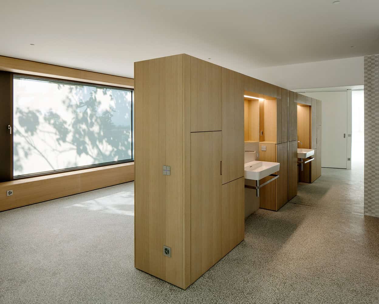 House in Hauterive, Switzerland by Bauzeit Architekten House in Hauterive, Switzerland by Bauzeit Architekten