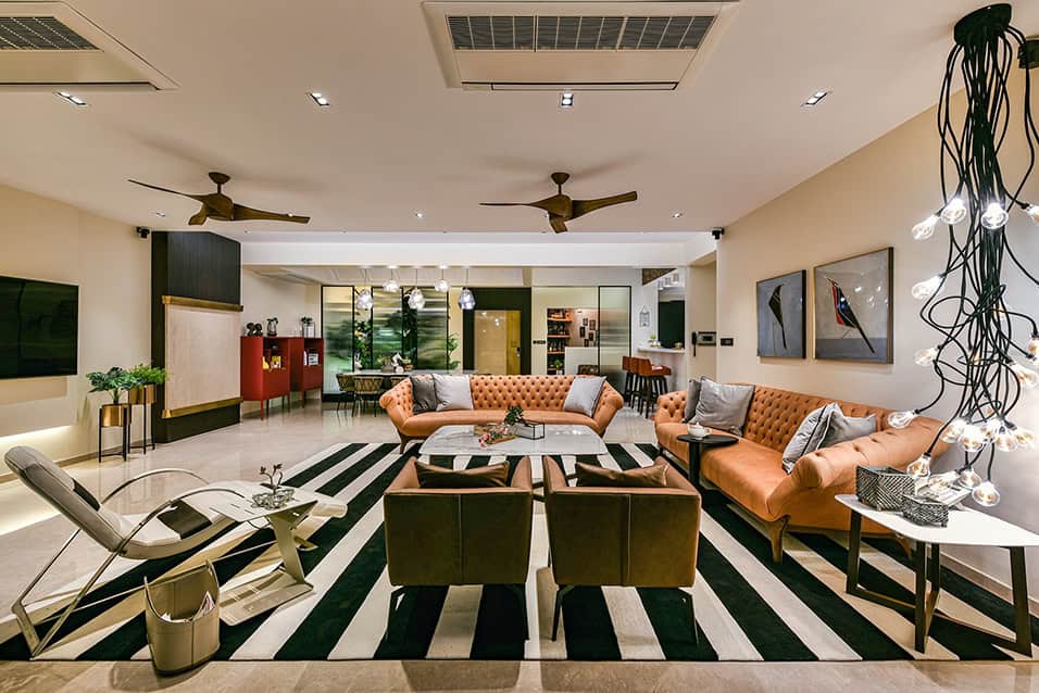 Contemporary living room interior design with stylish sofas, modern lighting, and elegant decor, showcasing innovative architecture art designs and comfortable home design ideas.