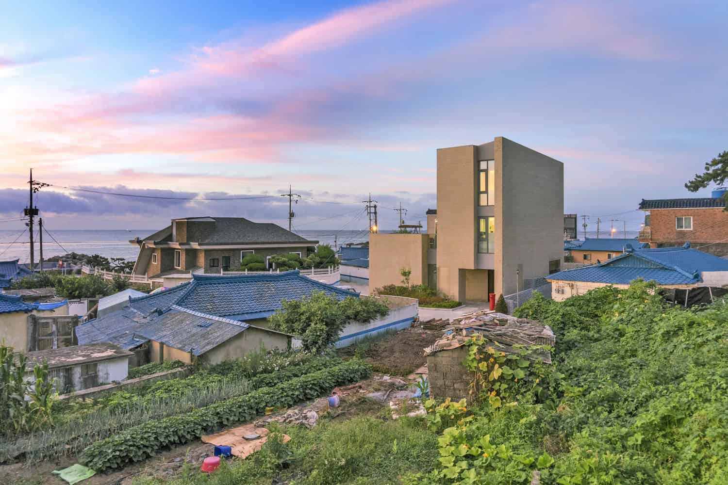 Seaside Wall House by KHY Architects in South Korea