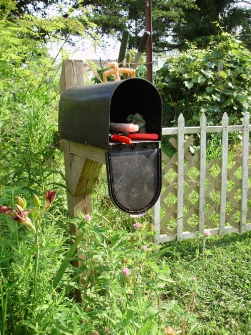 12. Upcycled Mailbox Garden Tool Holder 12. Upcycled Mailbox Garden Tool Holder