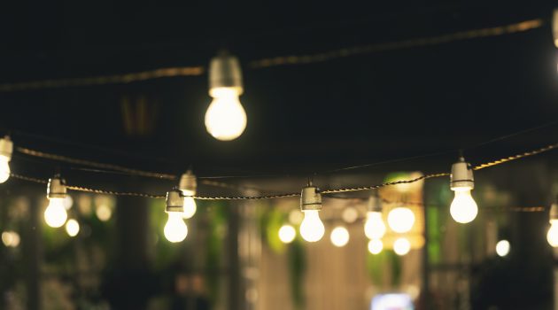 outdoor party string lights glowing at night