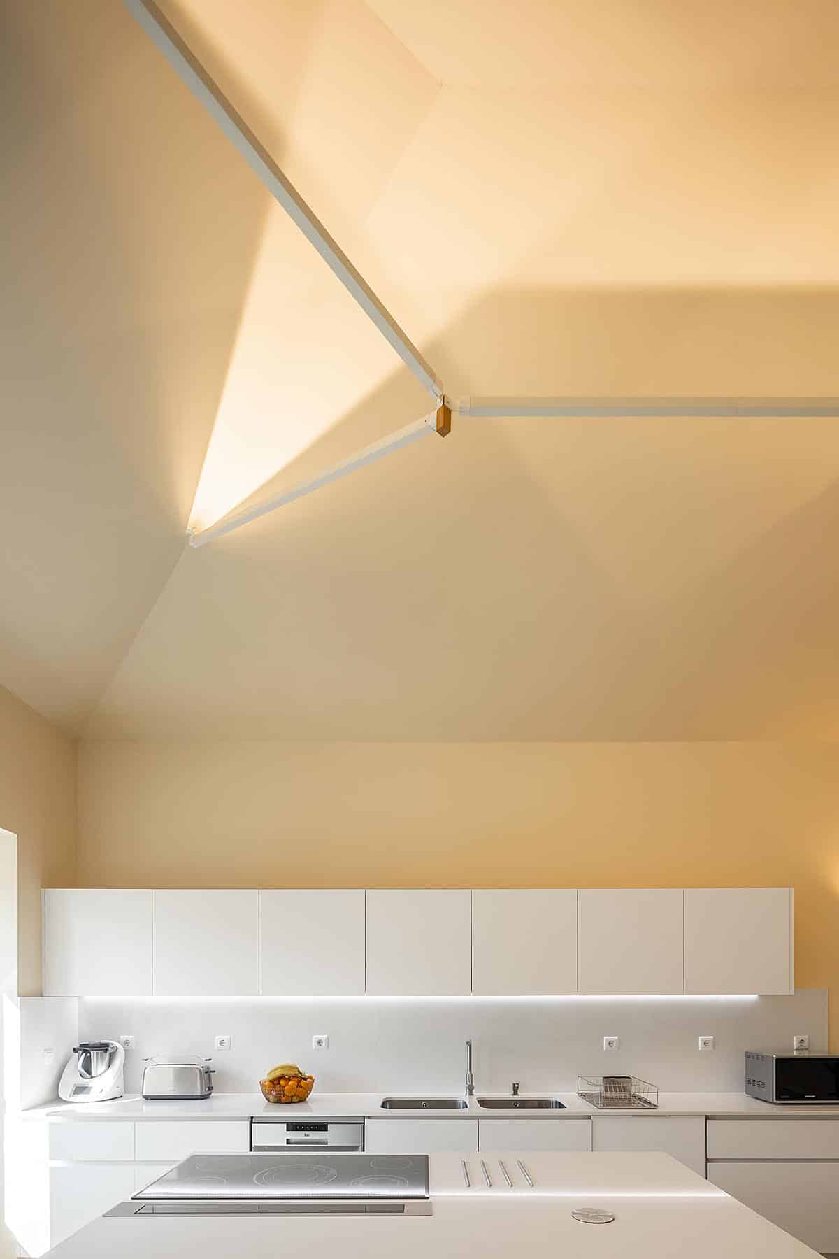 Interior lighting of a house in Porto, inspired by umbrellas Interior lighting of a house in Porto, inspired by umbrellas