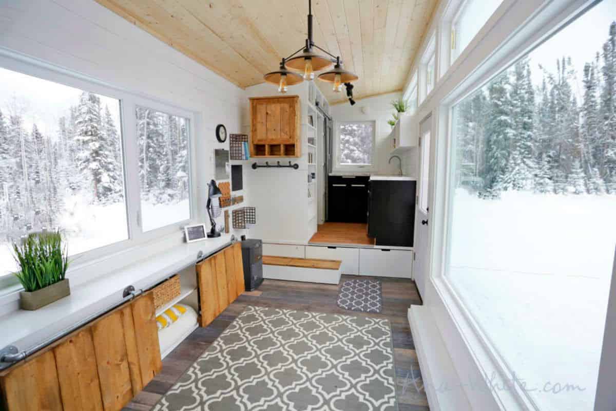 FLOOR-TO-CEILING WINDOWS, INVITING THE OUTDOORS INSIDE FLOOR-TO-CEILING WINDOWS, INVITING THE OUTDOORS INSIDE