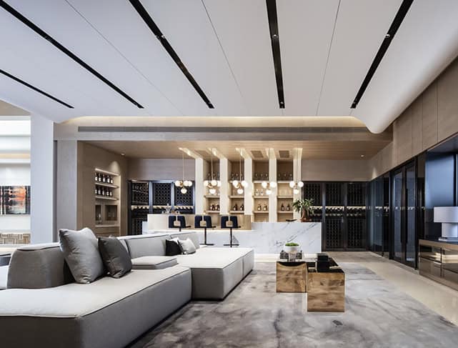 Luxurious modern living room with minimalist design, stylish furniture, and elegant lighting for contemporary architectural interior decor.