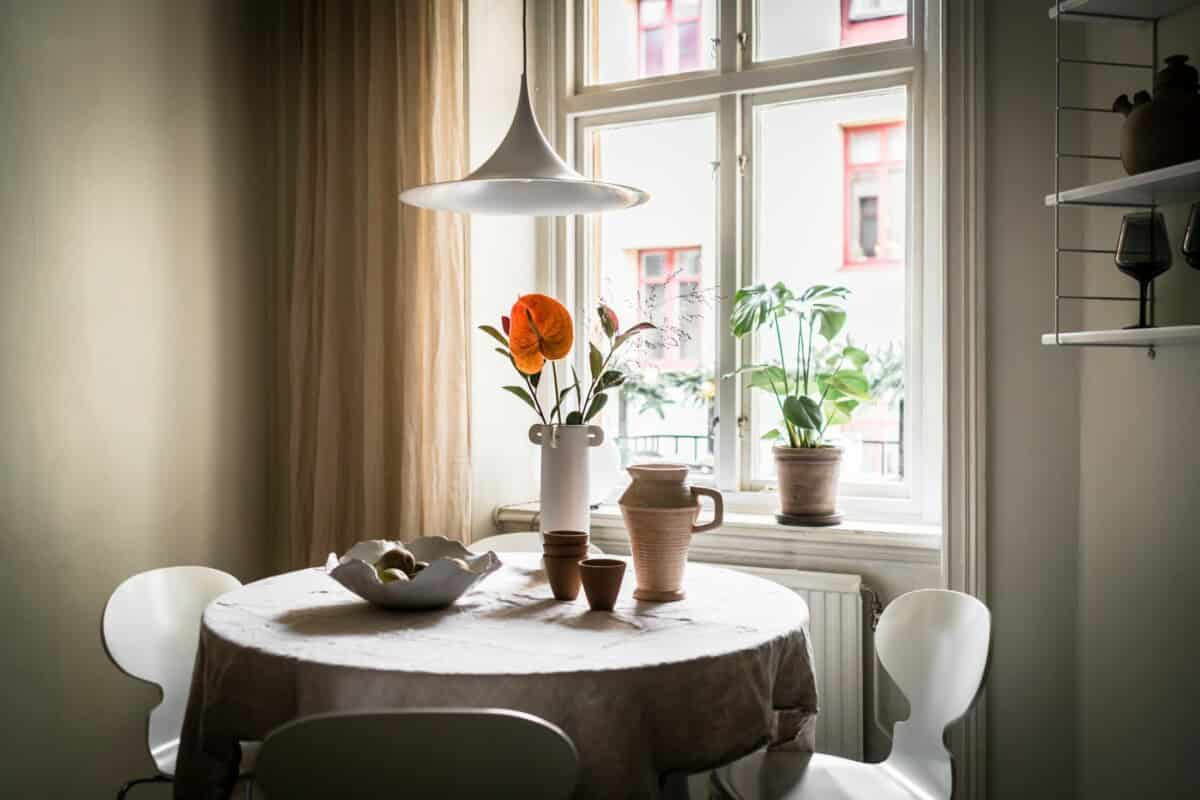 Combining a Chandelier & A Designer Lamp in the Living Room Combining a Chandelier & A Designer Lamp in the Living Room