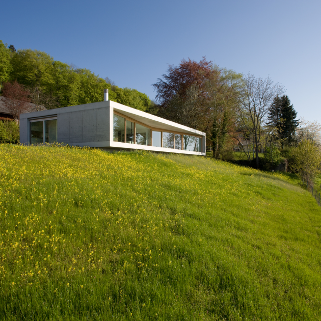 Gauthier House by Bauzeit Architekten in Evilard, Switzerland