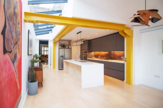 Yellow Steel House Extension by CVC Architecture in North London, UK