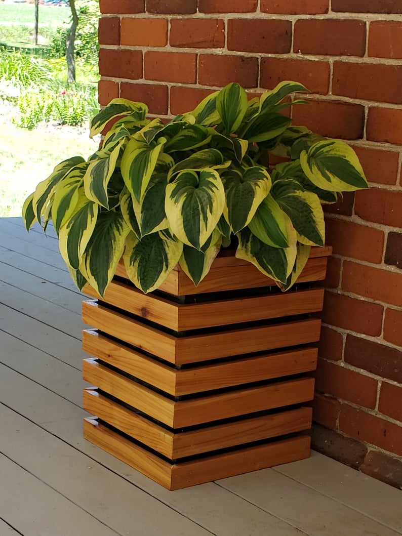 17 Awesome Planter Designs To Add To Your Patio This Spring