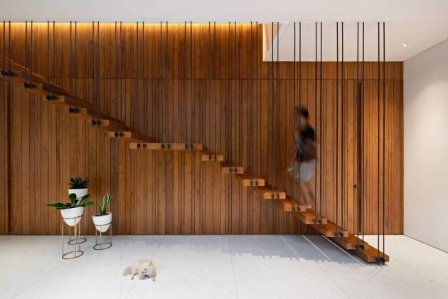Between 2 Courtyards House by eben in Indonesia
