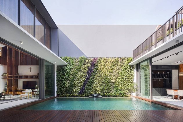 Between 2 Courtyards House by eben in Indonesia