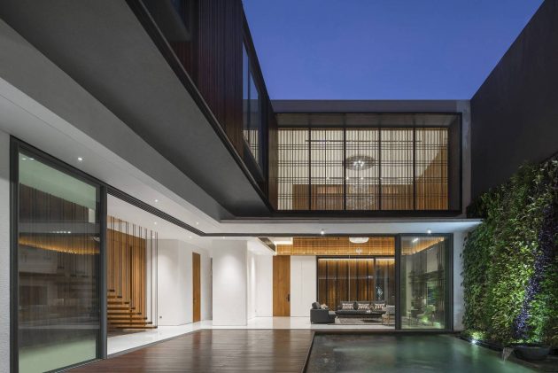 Between 2 Courtyards House by eben in Indonesia