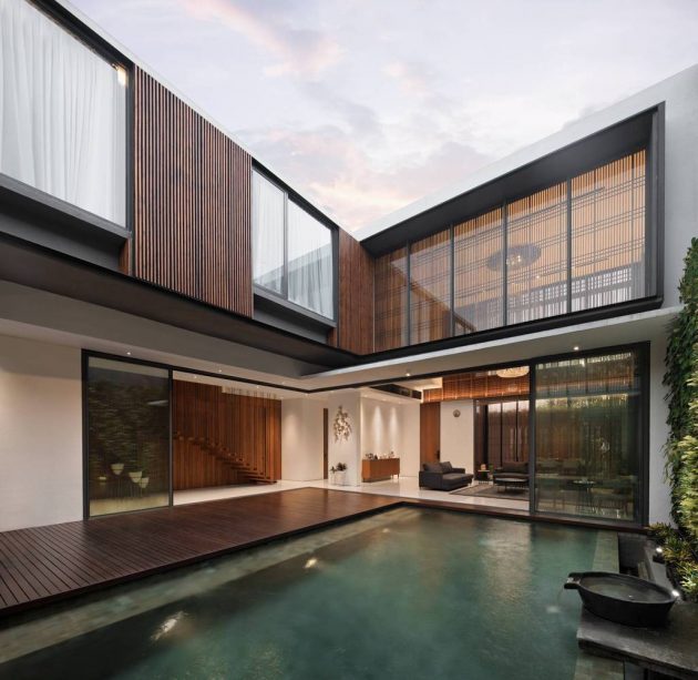 Between 2 Courtyards House by eben in Indonesia