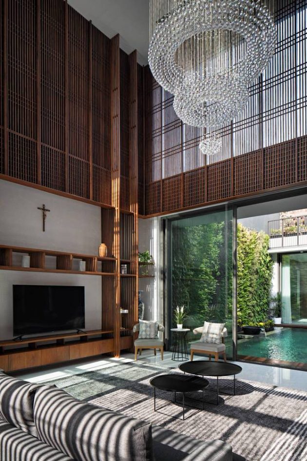 Between 2 Courtyards House by eben in Indonesia