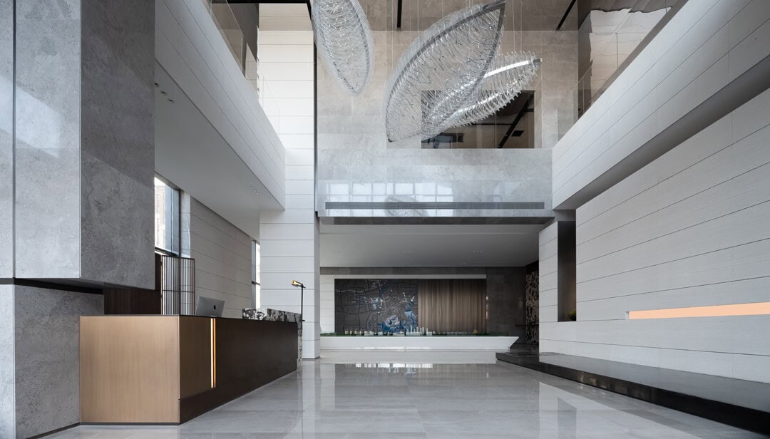 Sleek modern hotel lobby with contemporary architecture, minimalist design, and elegant lighting showcasing upscale interior architecture and interior design elements.