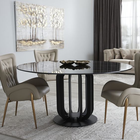 The Round Black Marble Table Is The Absolute Favorite