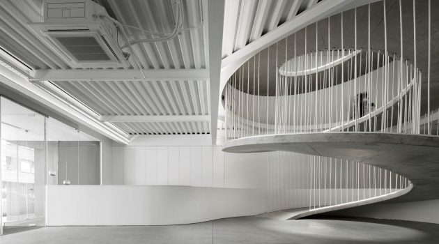 Office stairs as a sculptural piece designed by Paulo Merlini Architects