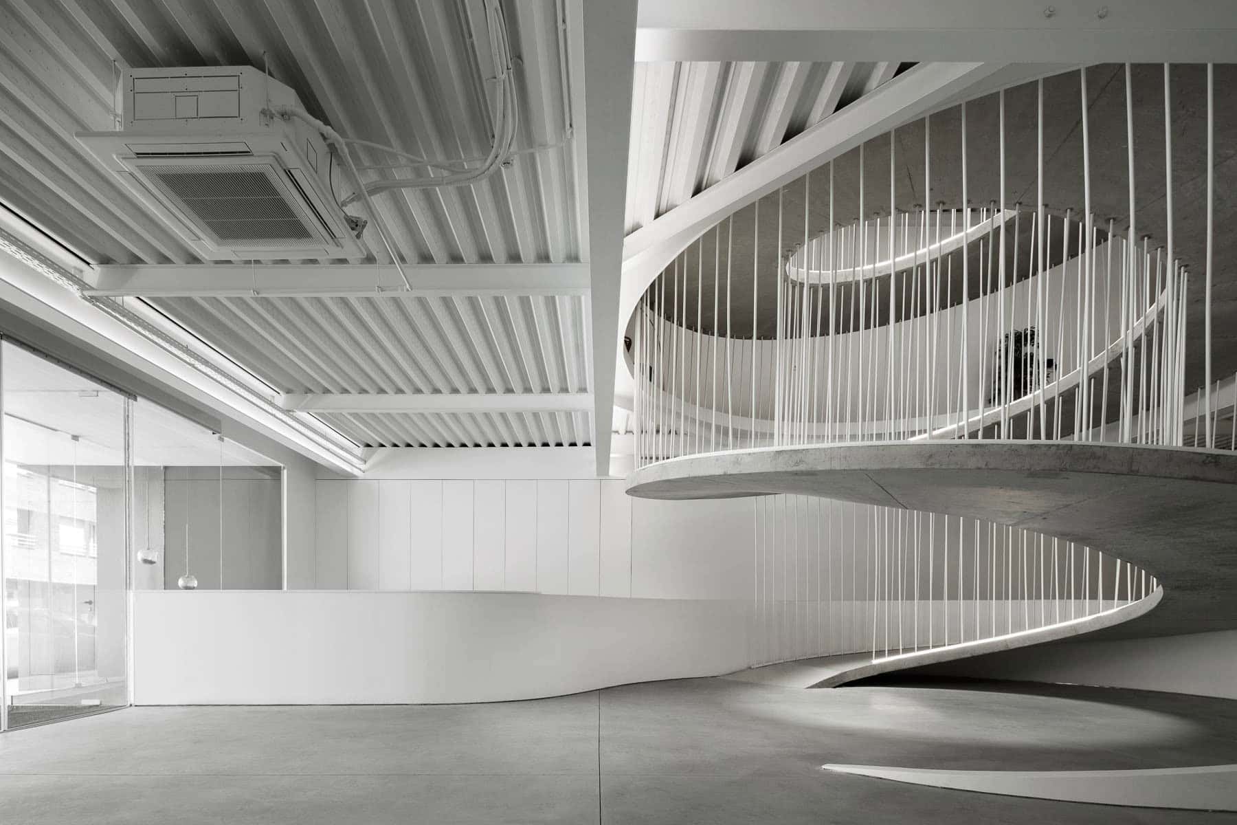 Office stairs as a sculptural piece designed by Paulo Merlini Architects