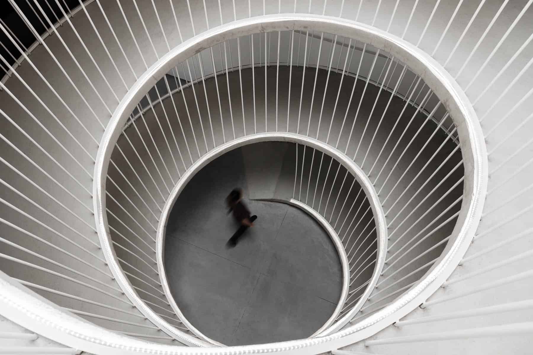 Office stairs as a sculptural piece designed by Paulo Merlini Architects Office stairs as a sculptural piece designed by Paulo Merlini Architects