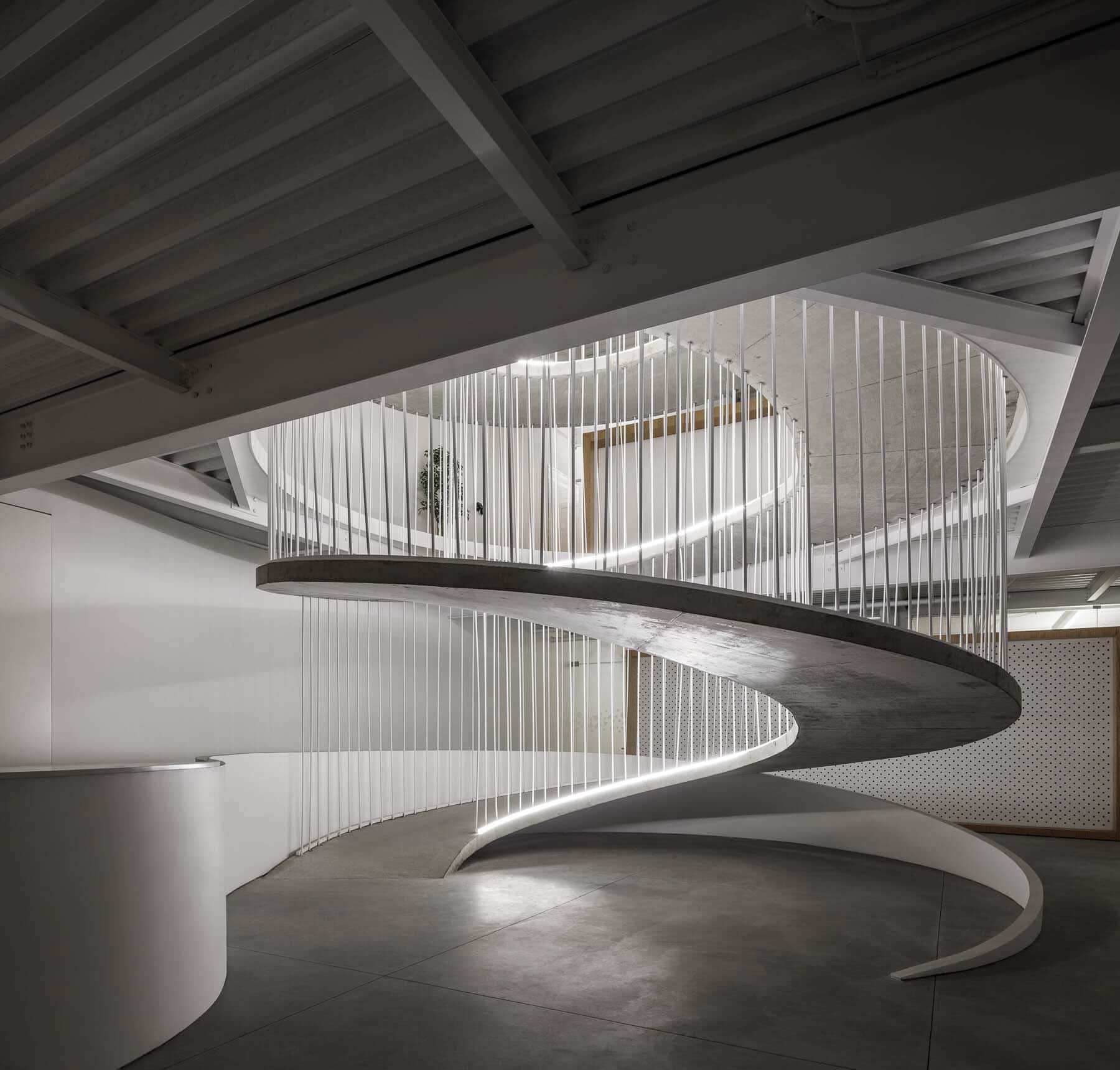 Office stairs as a sculptural piece designed by Paulo Merlini Architects Office stairs as a sculptural piece designed by Paulo Merlini Architects