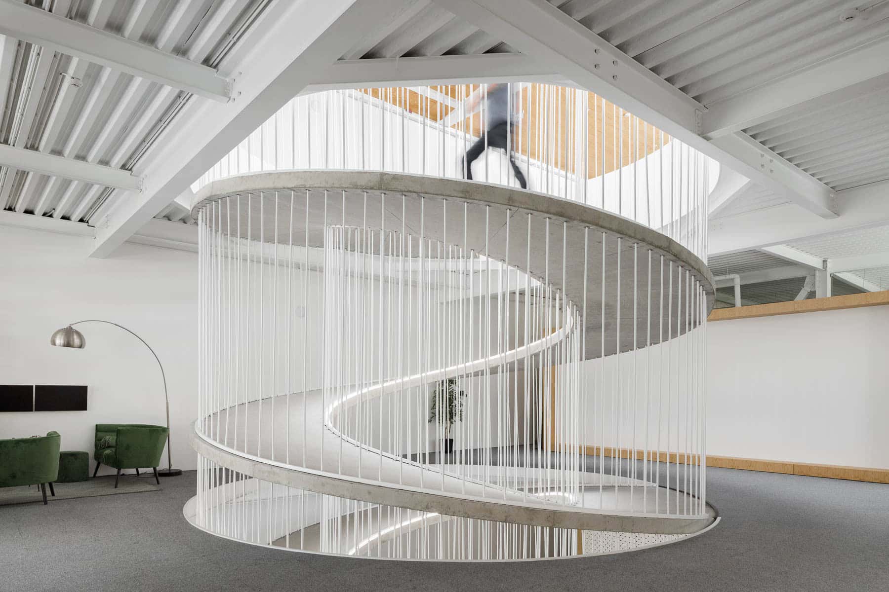 Office stairs as a sculptural piece designed by Paulo Merlini Architects Office stairs as a sculptural piece designed by Paulo Merlini Architects