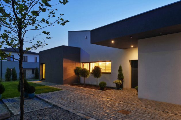 M House by RS+ Robert Skitek in Tychy, Poland