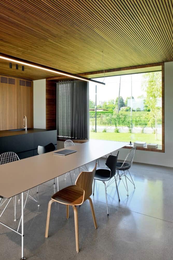 House Surrounded by Greenery by MIDE Architects in Stra, Italy