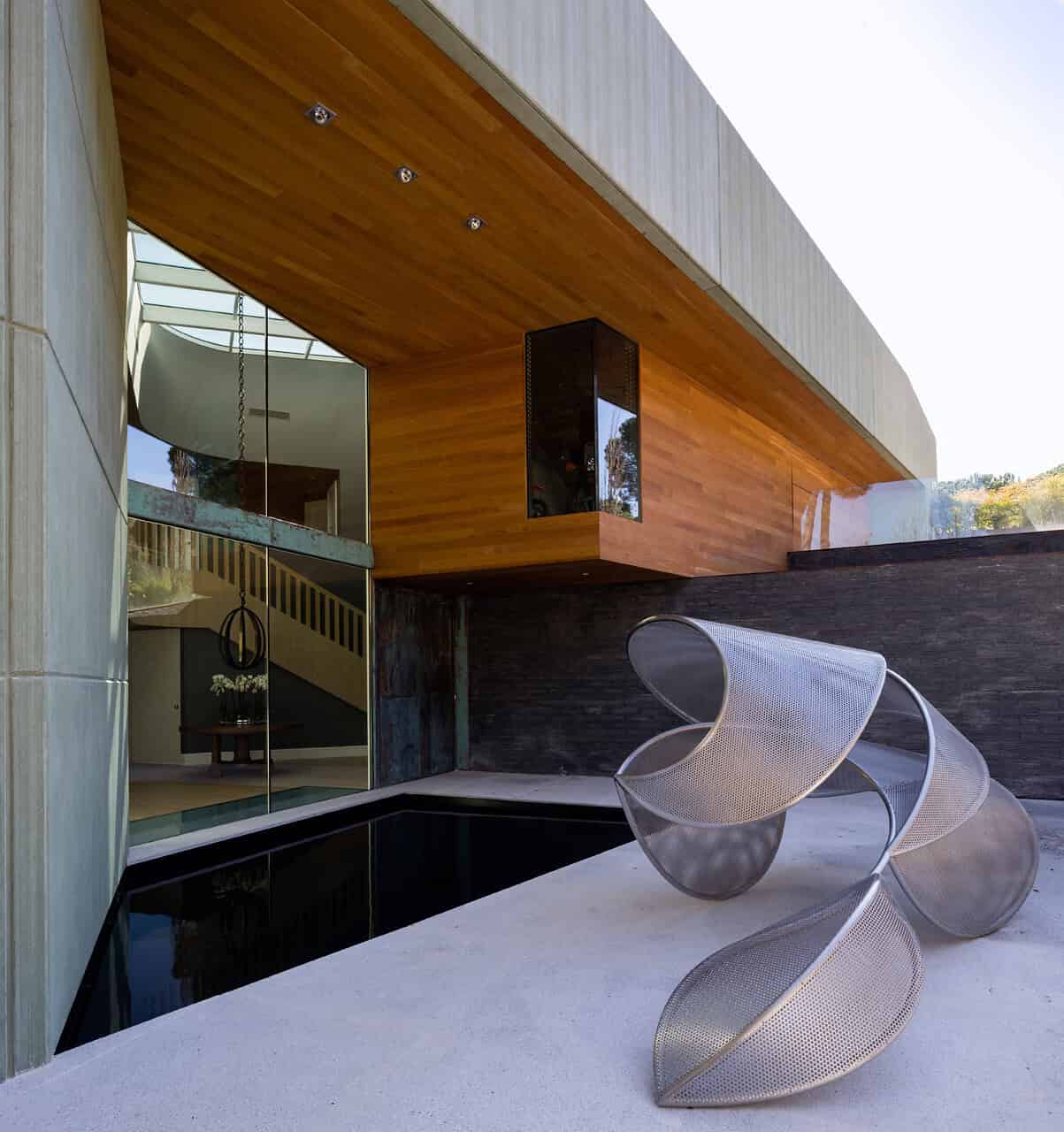 House in Pantano de San Juan by GEO Arquitectos in Cebreros, Spain