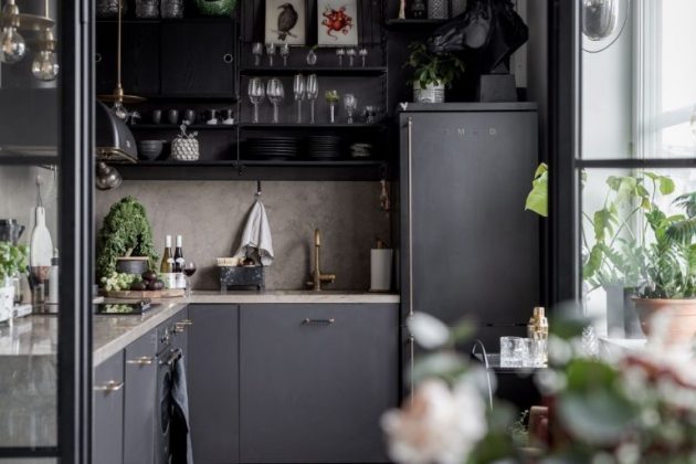 Nordic Kitchen With Black Furniture And Appliances