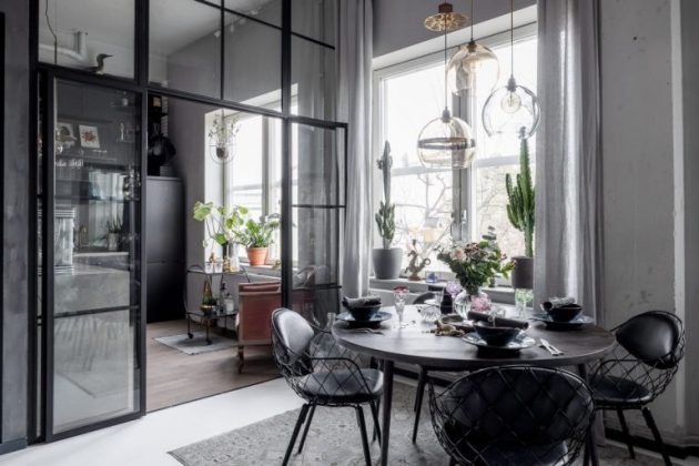 Nordic Kitchen With Black Furniture And Appliances