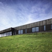 Parihoa by Pattersons Associates in Muriwai, New Zealand