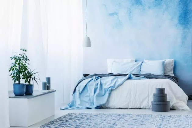 A Sky Blue Bedroom With A Cozy Decor