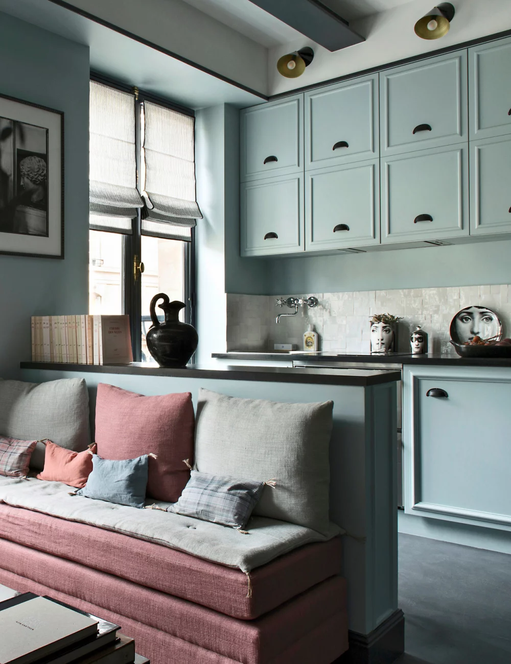 A small kitchen open to the living room A small kitchen open to the living room