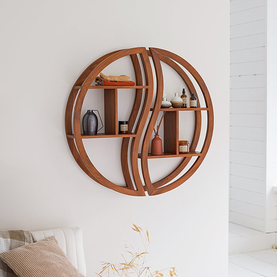 A Round Wall Shelf To Dress Your Walls With Originality
