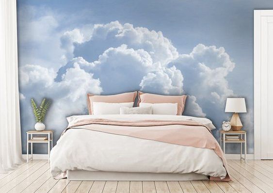 Un dormitorio azul cielo con una decoración acogedora
