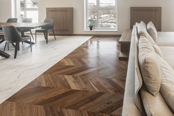 Which materials to choose for flooring: parquet, waxed concrete or tiles?