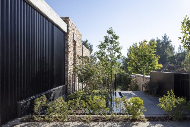 Contemporary Stone Villa by Dana Oberson Architects in Neve Ilan, Israel