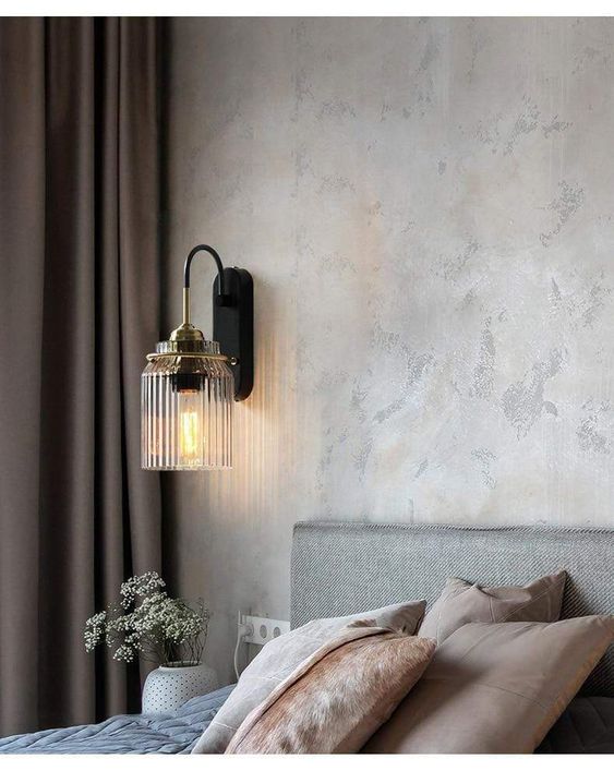 Elegant And Optimized Bedroom With Wall-Mounted Bedside Lamps