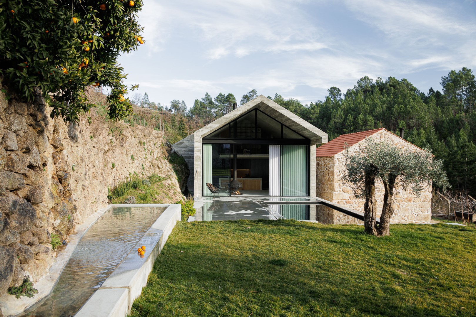 Casa NaMora: A love story between granite and concrete in a Portuguese farm house Casa NaMora: A love story between granite and concrete in a Portuguese farm house