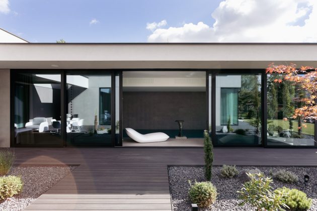 Single family house with pool by EASST Architects in Poznan, Poland