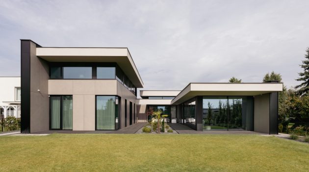 Single family house with pool by EASST Architects in Poznan, Poland