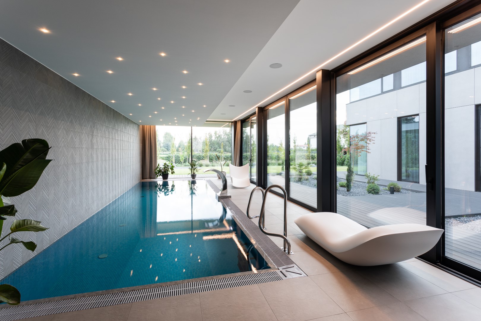 Single family house with pool by EASST Architects in Poznan, Poland Single family house with pool by EASST Architects in Poznan, Poland