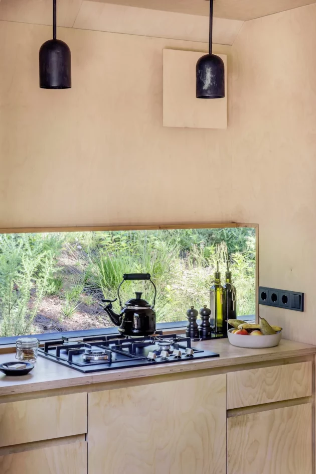 A dreamy wood and glass cabin for outdoor living