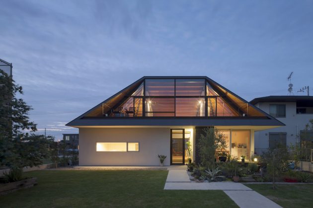 House with a Large Hipped Roof by Naoi Architecture & Design Office in Japan
