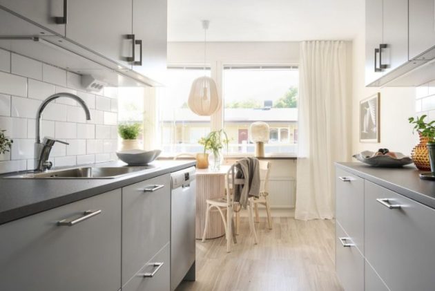 Bright kitchen next to the hall is the perfect space solution