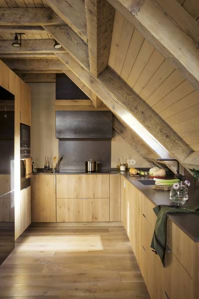 A warm and cosy mountain cabin lined with wood and flannel