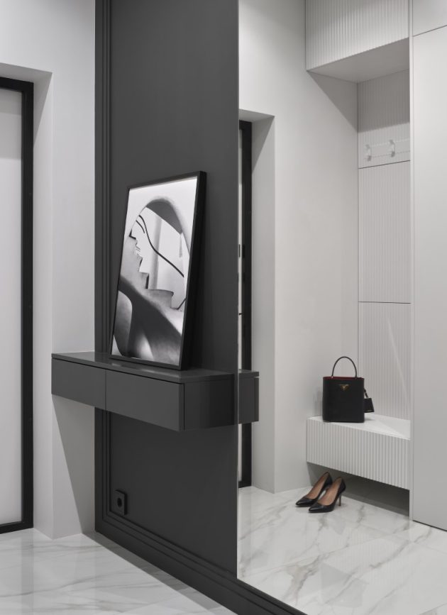 Contrasting Black & White Apartment in Neo-Classical Style by LINES bureau