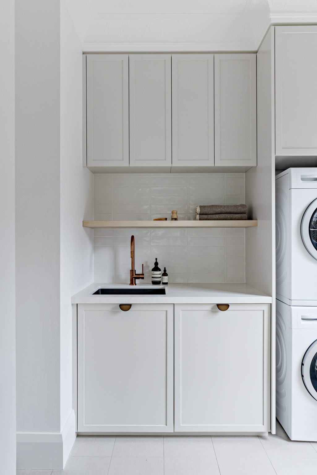 View of 16 Practically Elegant Scandinavian Laundry Room Interior Designs
