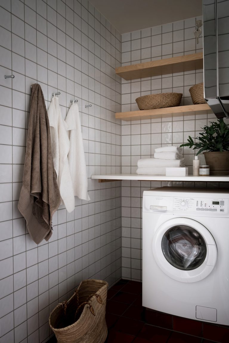 View of 16 Practically Elegant Scandinavian Laundry Room Interior Designs
