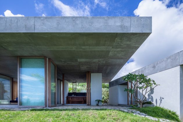 House in Tamagusuku by Studio Cochi Architects in Nanjo, Japan